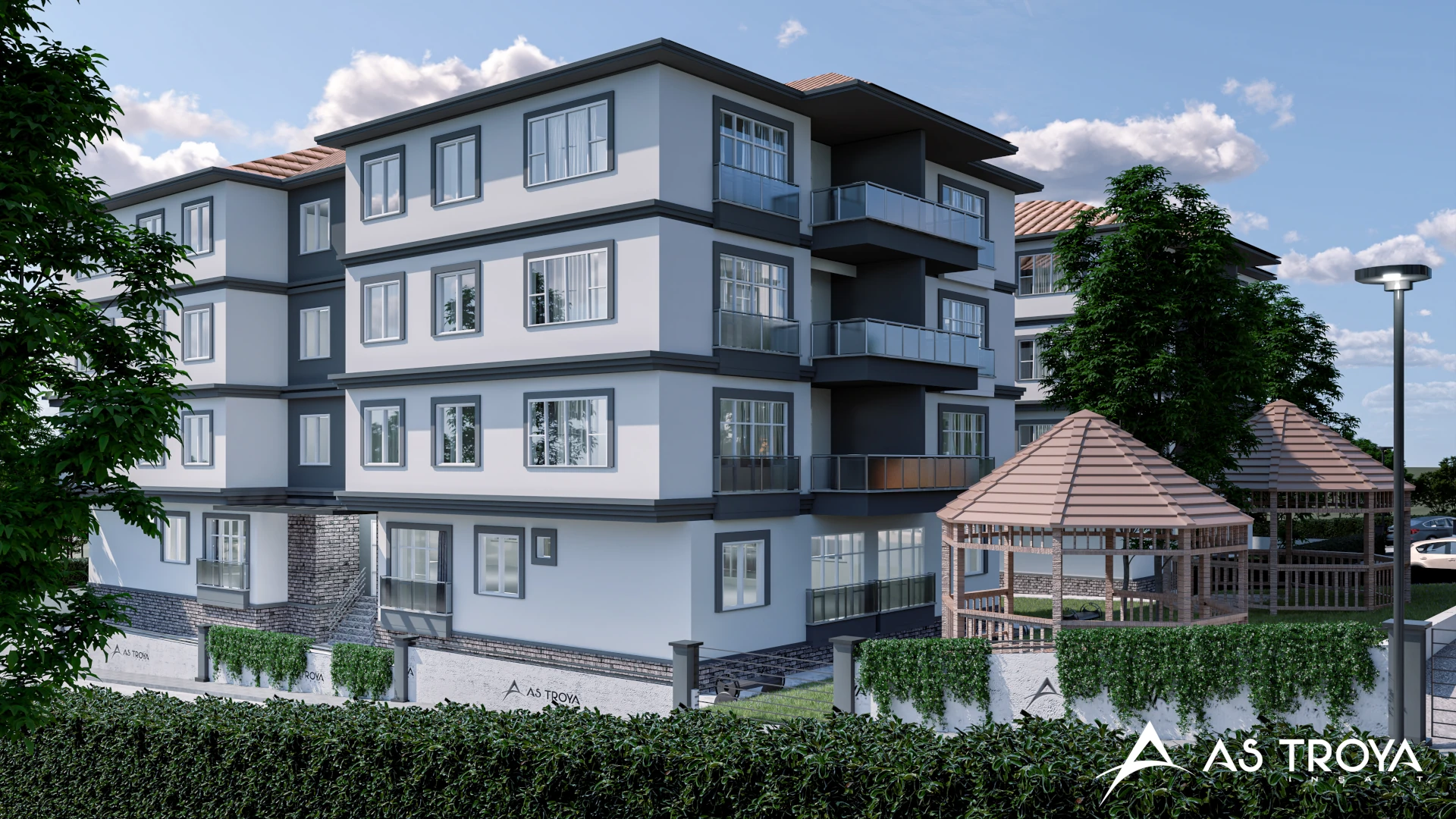 Bu resim, modern mimari özelliklere sahip bir apartman binasını gösteriyor. Bina, geniş balkonları ve büyük pencereleriyle dikkat çekiyor. Yeşil bir peyzaj ile çevrili olan yapı, rahatlattıcı bir çevre sunuyor. Ayrıca, bahçede bir ahşap pergole de yer alıyor. Şık bir tasarıma sahip olan bu konut, sakinlerini konforlu bir yaşam alanıyla buluşturmayı amaçlıyor.